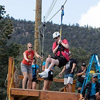 Camper goes down the zipline
