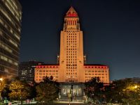 LA City Hall lit up in orange