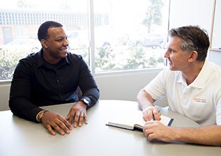 Bob Hope Veterans Support Employment Specialist counseling a veteran