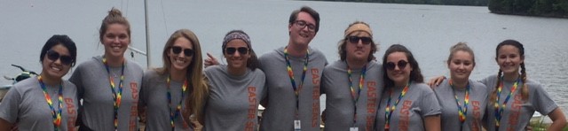 Camp counselors with gray shirts