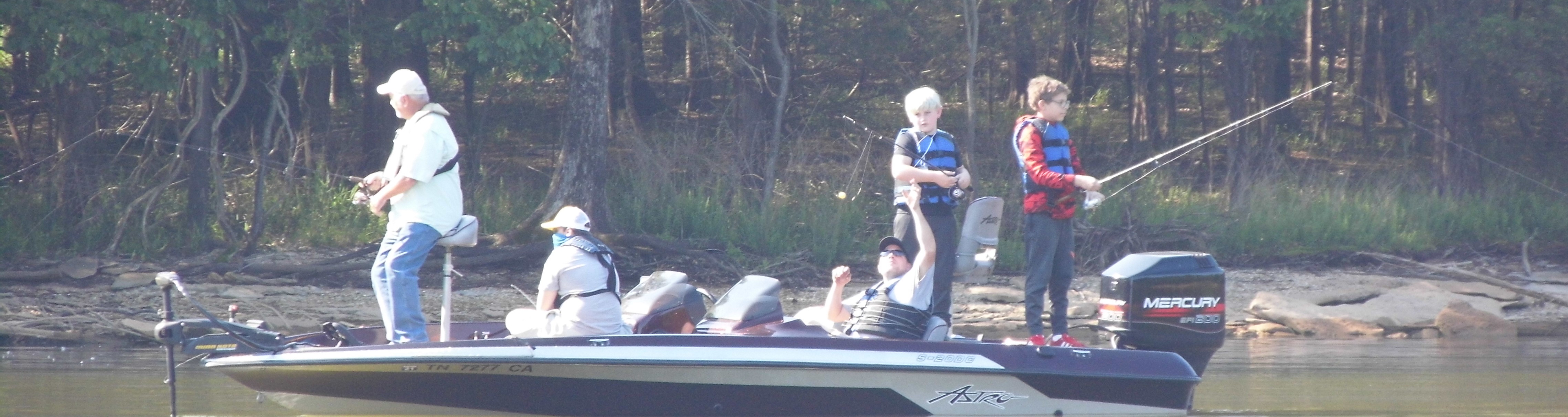 guys fishing on boat