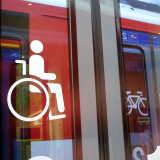 Bus doors with disability sticker