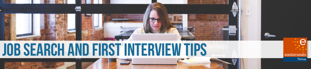 First Interview and Job Hunt tips, woman sitting at a desk in an open-space office 