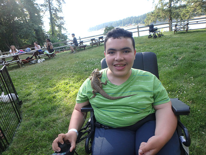 Yassine with Iguana