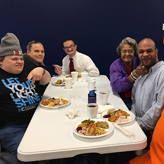 Adult Services participants having Thanksgiving lunch